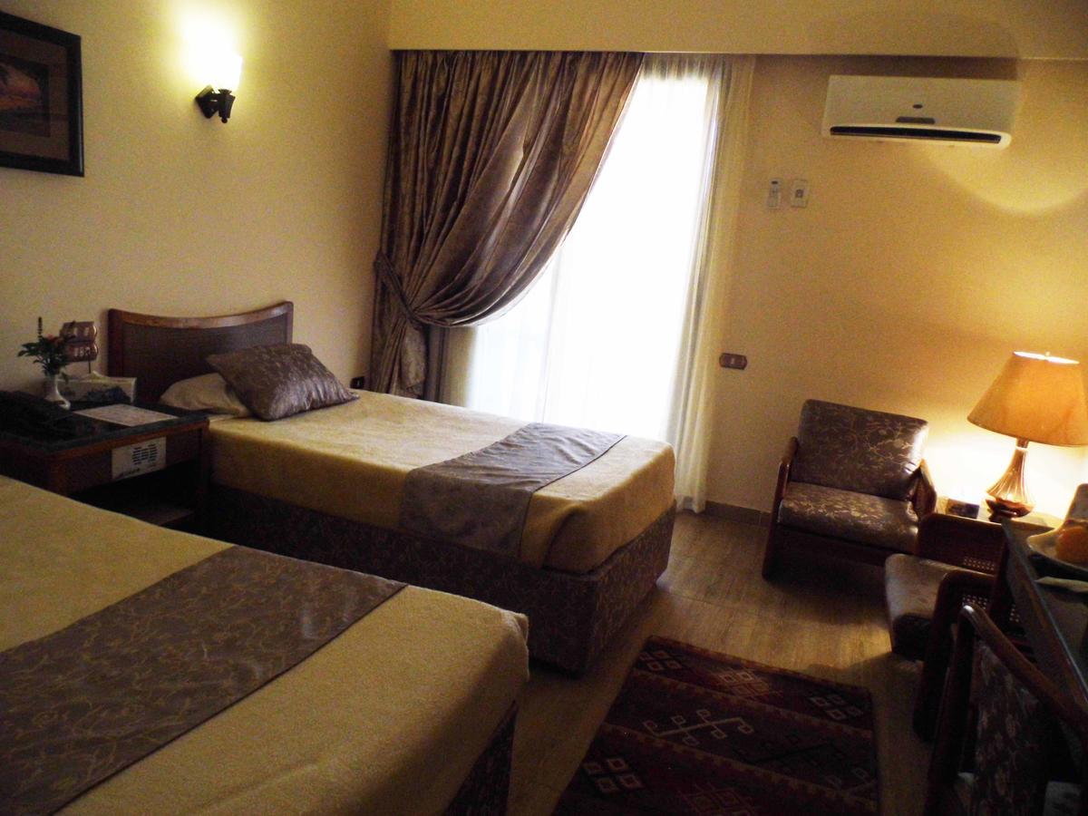 Mg Nefertiti Hotel Al-Minya Extérieur photo